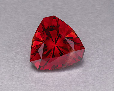 Flawless 22.98 ct neon red cuprian Oregon Sunstone, Pana Mine 2018, faceted by Jeff Hapeman