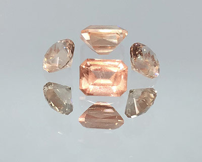 1 ct Emerald and Round Brilliant Cut Schiller Oregon Sunstones, rough from Spectrum mine.