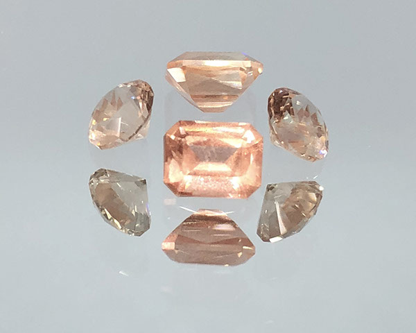 1 ct Emerald and Round Brilliant Cut Schiller Oregon Sunstones, rough from Spectrum mine.