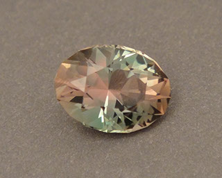 Green Oregon Sunstone with Shiller from Spectrum Mine